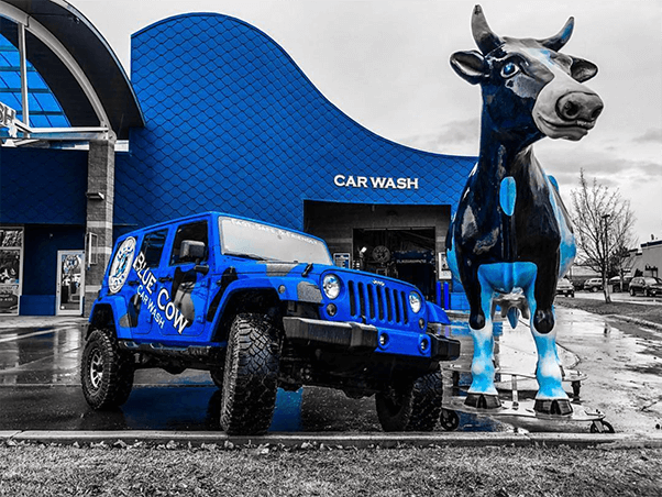 Blue jeep with mascot